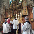 Fr Bob rededicating High Altar Reredos on its Centenary 